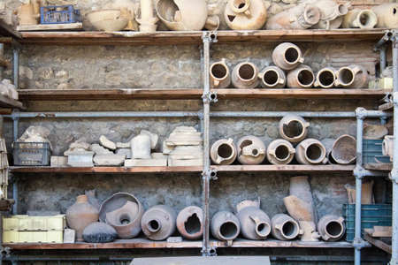 Pompeii, Italy, June 26, 2020 amphorae in an ancient deposit found after the excavations later to the eruption of the volcano Vesuvius in 79 AD.のeditorial素材