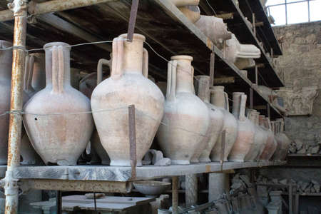 Pompeii, Italy, June 26, 2020 amphorae in an ancient deposit found after the excavations later to the eruption of the volcano Vesuvius in 79 AD.のeditorial素材