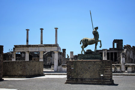 Pompeii, Italy, June 26, 2020 evocative image of a statue positioned in the Central Forum of the ancient Roman cityのeditorial素材