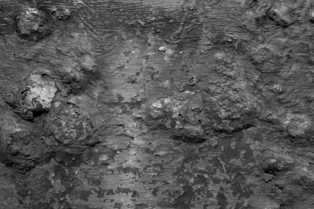 evocative black and white image of rusty iron surface texture