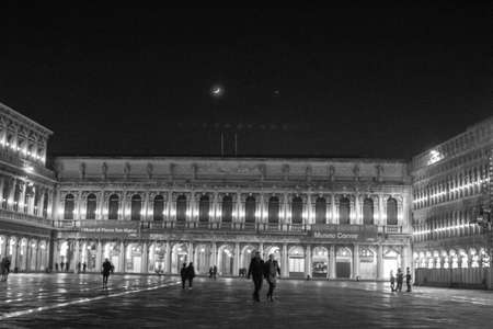 Venice, Italy, January 28, 2020 evocative black and white image of Piazza San Marco with the Basilica at nightのeditorial素材