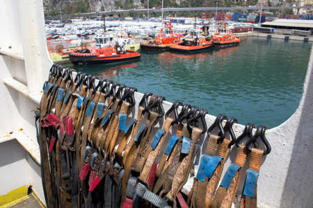 evocative image of vehicle lashing cables of a scheduled ferryの写真素材