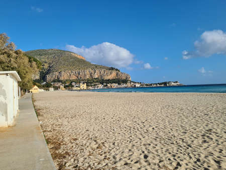 Mondello, Sicily, evocative image of the beach with clear water and a beautiful blue skyの写真素材