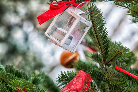 Christmas tree decoration bauble on decorated christmas treeの写真素材