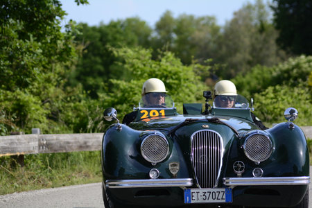 PESARO COLLE SAN BARTOLO, ITALY - MAY 17 - 2018: JAGUAR XK 120 LIGHTWEIGHT 1950 old racing car in...