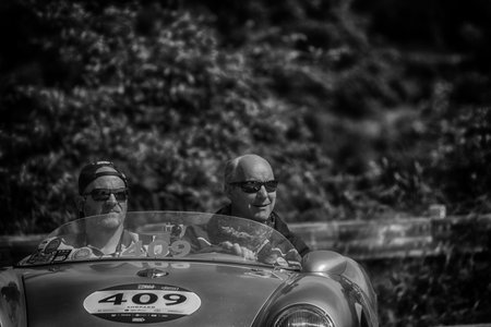 PESARO COLLE SAN BARTOLO, ITALY - MAY 17 - 2018: PORSCHE 550 SPYDER 1500 RS 1955 old racing car in Mille Miglia rally 2018 the famous italian historical race (1927-1957)のeditorial素材
