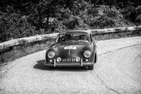 PESARO COLLE SAN BARTOLO, ITALY - MAY 17 - 2018: PORSCHE 356 A 1953 old racing car in the Mille Miglia rally 2018 the famous italian historical race (1927-1957)のeditorial素材