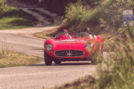 PESARO COLLE SAN BARTOLO, ITALY - MAY 17 - 2018: MASERATI 300 SPIDER FANTUZZI 1955 old racing car in the Mille Miglia rally 2018 the famous italian historical race (1927-1957)のeditorial素材