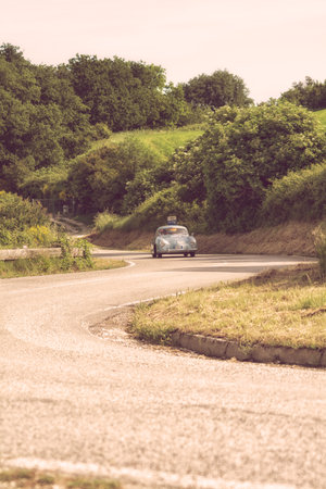 PESARO COLLE SAN BARTOLO, ITALY - MAY 17 - 2018: PORSCHE 356 1500 SUPER 1952 on an old racing car in the Mille Miglia rally 2018 the famous italian historical race (1927-1957)のeditorial素材