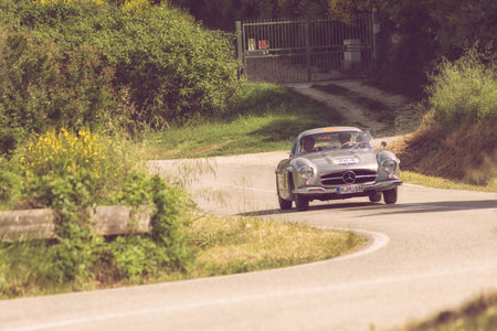 PESARO COLLE SAN BARTOLO , ITALY - MAY 17 - 2018 : MERCEDES-BENZ 300 SL COUPÃ‰ (W198) 1955 on an old racing car in rally Mille Miglia 2018 the famous italian historical race (1927-1957)