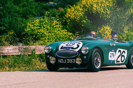 PESARO COLLE SAN BARTOLO , ITALY - MAY 17 - 2018 : AUSTIN HEALEY 100 S 1953 on an old racing car in rally Mille Miglia 2018 the famous italian historic RACEのeditorial素材