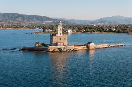 A view of lighthouse in Olbia gulf on sunset hourの写真素材