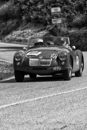 PESARO COLLE SAN BARTOLO , ITALY - MAY 17 - 2018 : MG A 1955 on an old racing car in rally Mille...