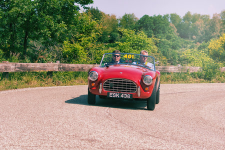 PESARO COLLE SAN BARTOLO, ITALY - MAY 17 - 2018: AC ACE 1955 on an old racing car in rally Mille Miglia 2018 the famous italian historical race (1927-1957)のeditorial素材