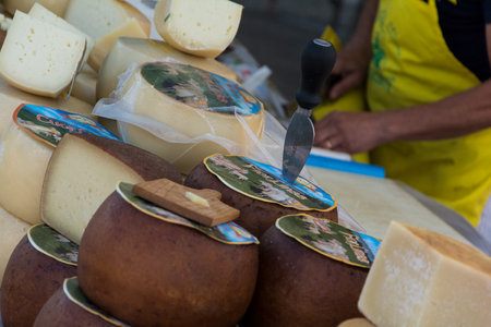 SAN PANTALEO , ITALY - AUGUST 14 2019 : Sardinian Pecorino cheese at San Pantaleo marketのeditorial素材