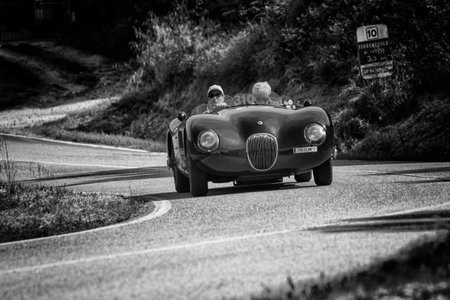 PESARO COLLE SAN BARTOLO , ITALY - MAY 17 - 2018 : JAGUAR C-TYPE 1952 on an old racing car in rally Mille Miglia 2018 the famous italian historical race (1927-1957)のeditorial素材