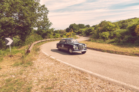 PESARO COLLE SAN BARTOLO , ITALY - MAY 17 - 2018 : LANCIA AURELIA B 20 GT 2000 1952 on an old racing car in rally Mille Miglia 2018 the famous italian historical race (1927-1957)のeditorial素材