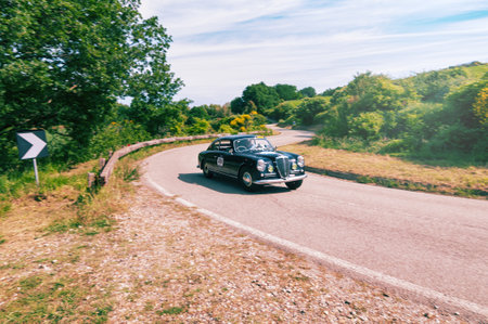 PESARO COLLE SAN BARTOLO , ITALY - MAY 17 - 2018 : LANCIA AURELIA B 20 GT 2000 1952 on an old racing...