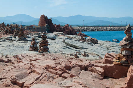 Sardinia Coastline: Typical Red Rocks and Cliffs near Sea in Arbatax; Italyの写真素材