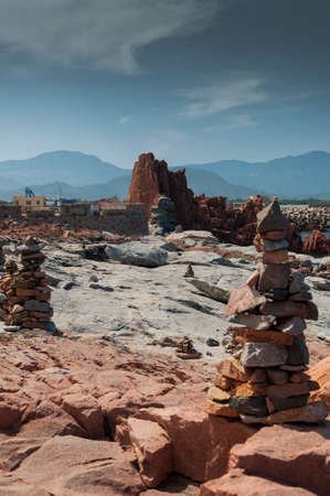 Sardinia Coastline: Typical Red Rocks and Cliffs near Sea in Arbatax; Italyの写真素材
