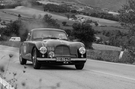 CAGLI, ITALY - OCT 24 - 2020: ASTON MARTIN DB 2 1952 on an old racing car in rally Mille Miglia 2020 the famous italian historical race (1927-1957)のeditorial素材