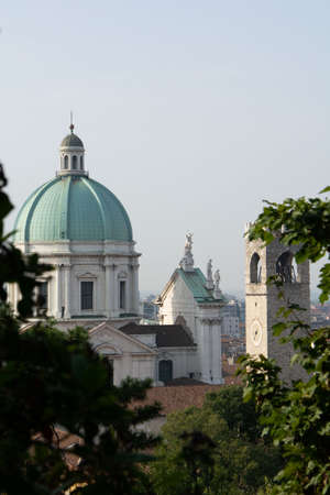 Cathedral or Duomo Nuovo and Old Cathedral or Duomo Vecchio at the Piazza Paolo square in Brescia city in north Italyの写真素材
