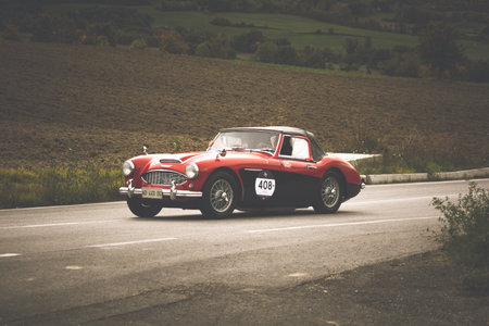 CAGLI, ITALY - OCT 24 - 2020: AUSTIN HEALEY 100 6 1957 an old racing car in rally Mille Miglia 2020...
