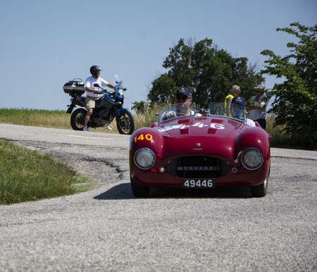 URBINO, ITALY - JUN 16 - 2022: CISITALIA 202 S MM SPIDER 1947 on an old racing car in rally Mille Miglia 2022 the famous italian historical race (1927-1957)のeditorial素材