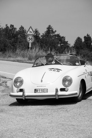 URBINO, ITALY - JUN 16 - 2022: PORSCHE 356 1500 SPEEDSTER 1955 on an old racing car in rally Mille...
