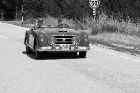 URBINO, ITALY - JUN 16 - 2022: NASH HEALEY ROADSTER 1953 on an old racing car in rally Mille Miglia 2022 the famous italian historical race (1927-1957のeditorial素材