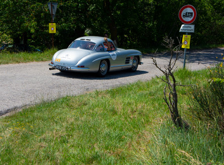 ITALY - JUN 16 - 2022: MERCEDES BENZ 300 SL ROADSTER 1957 on an old racing car in rally Mille Miglia...