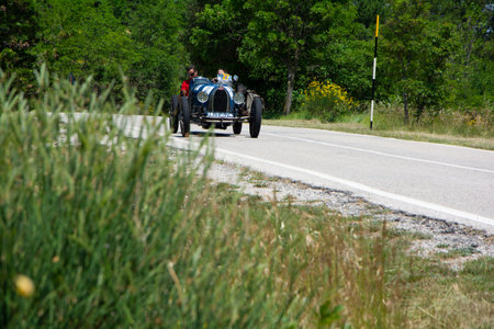 URBINO - ITALY - JUN 16 - 2022: BUGATTI T37 A 1927 on an old racing car in rally Mille Miglia 2022 the famous italian historical race (1927-1957のeditorial素材