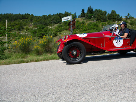 URBINO - ITALY - JUN 16 - 2022: ALFA ROMEO 6C 1750 GRAN SPORT CARR. SPORT 1930 on an old racing car in rally Mille Miglia 2022 the famous italian historical race (1927-1957のeditorial素材