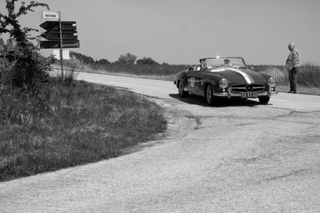 URBINO - ITALY - JUN 16 - 2022: MERCEDES-BENZ 190 SL 1957 on an old racing car in rally Mille Miglia...