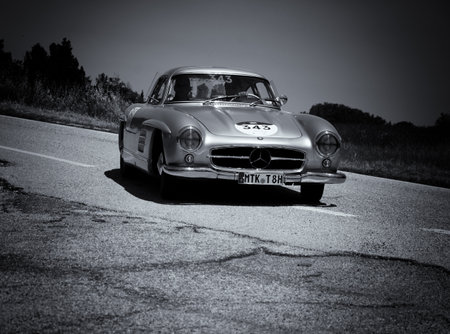 URBINO - ITALY - JUN 16 - 2022: MERCEDES-BENZ 300 SL (W198) 1954 on an old racing car in rally Mille...