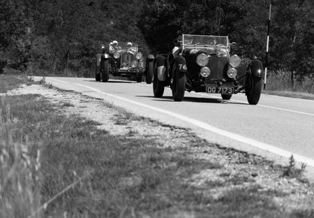 URBINO - ITALY - JUN 16 - 2022: ASTON MARTIN LE MANS 1933 on an old racing car in rally Mille Miglia...