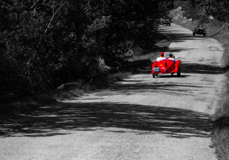 URBINO, ITALY - JUN 16 - 2022 : FIAT 508 S BALILLA COPPA D ORO 1933 on an old racing car in rally...