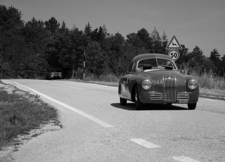 URBINO, ITALY - JUN 16 - 2022 : FIAT 1100 S MM GOBBONE 1948 on an old racing car in rally Mille Miglia 2022 the famous italian historical raceのeditorial素材