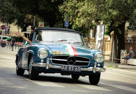 Pesaro , ITALY - jun 14 - 2023 : MERCEDES BENZ 190 SL 1957 on an old racing car in rally Mille Miglia 2023 the famous italian historical race (1927-1957)のeditorial素材
