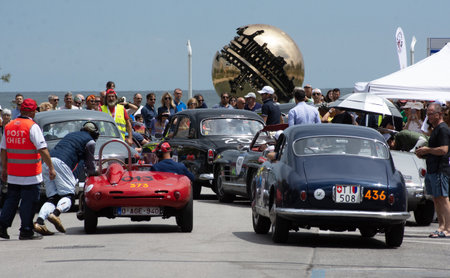 Pesaro , ITALY - jun 14 - 2023 : MORETTI 750 GRAN SPORTBERLINETTA 1955 on an old racing car in rally Mille Miglia 2023 the famous italian historical race (1927-1957)のeditorial素材