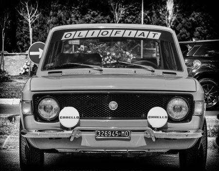 vintage Fiat 128 Sport at a rally