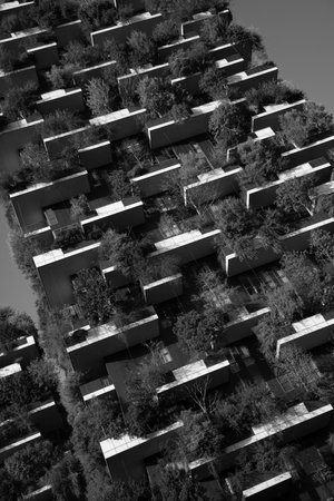Milan, ITALY - 02 Nov - 2024 : The Bosco Verticale in Milan, two towers covered with trees and plants, symbolizes green architecture in the heart of the cityの写真素材
