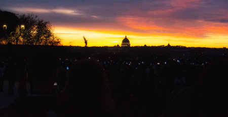 ROME, ITALY - DEC 7 -2025 : A breathtaking panoramic view of the Roman sunset, captured from the...