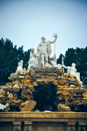 Wien; Austria - Neptune Fountain at SchÃ¶nbrunn Garden in winter. Details of the statuesのeditorial素材