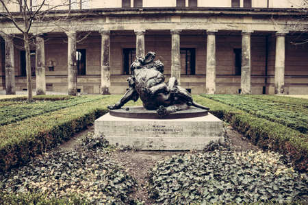 Berlin, Germany - Statue of Hercules and the lion in the garden of the National gallery of Berlinのeditorial素材