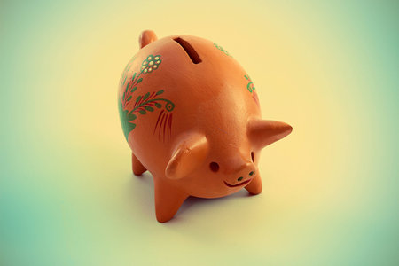 Piggy bank with a retro vintage effectの写真素材