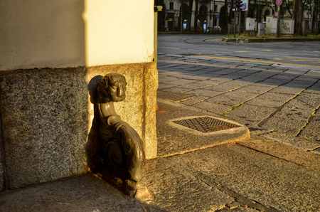 Turin, Piemote, Italy. July 2018. Vintage urban furnishing details: the pararuota or the kerbstones in the gates of the old houses in the center are small works of art.のeditorial素材