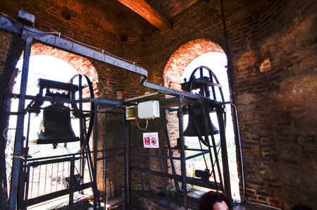 La morra, Piedmont, Italy. July 2018. The bells at the top of the bell tower in the historic center. From which you can enjoy a splendid view of the village and the surrounding countryside.のeditorial素材
