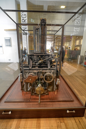 London, United Kingdom, June 2018. Babbage's machine is the progenitor of modern computers. It is a mechanical analogic computer, conserved at the London Science Museum.のeditorial素材