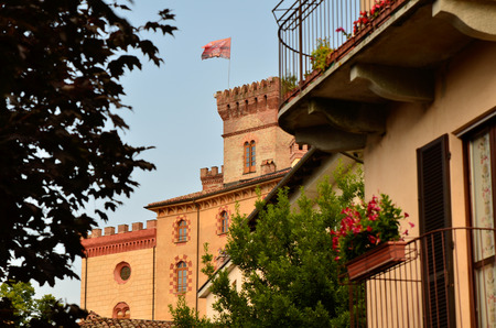 Barolo, province of Cuneo, Piedmont, Italy. July 2018. View of the castle of Barolo, home of the wine museum, is the landmark of the town: clearly visible from any point of view.のeditorial素材
